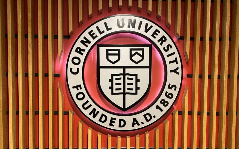 Cornell seal on wall in Willard Straight Hall