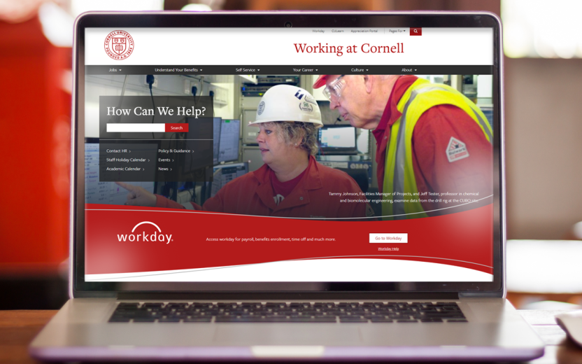 laptop displaying new website homepage